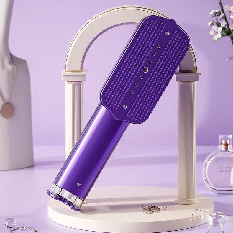 Défroisseur vapeur portable GoLiss violet compact et élégant, conçu pour le voyage